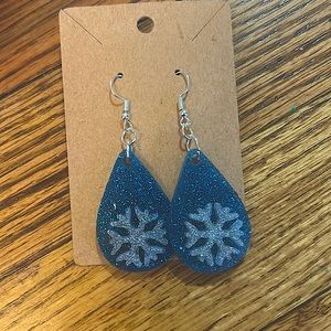 Beautiful, blue handmade earrings with silver snowflake
